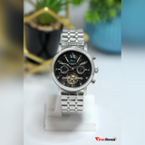 Patek Philippe black dial skeleton watch front view with stainless steel bracelet