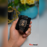 Poedager black skeleton watch displayed in hand