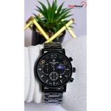 Patek Philippe black men's chronograph watch held in hand