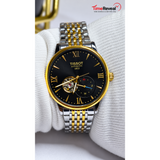 TISSOT automatic skeleton watch black dial gold details